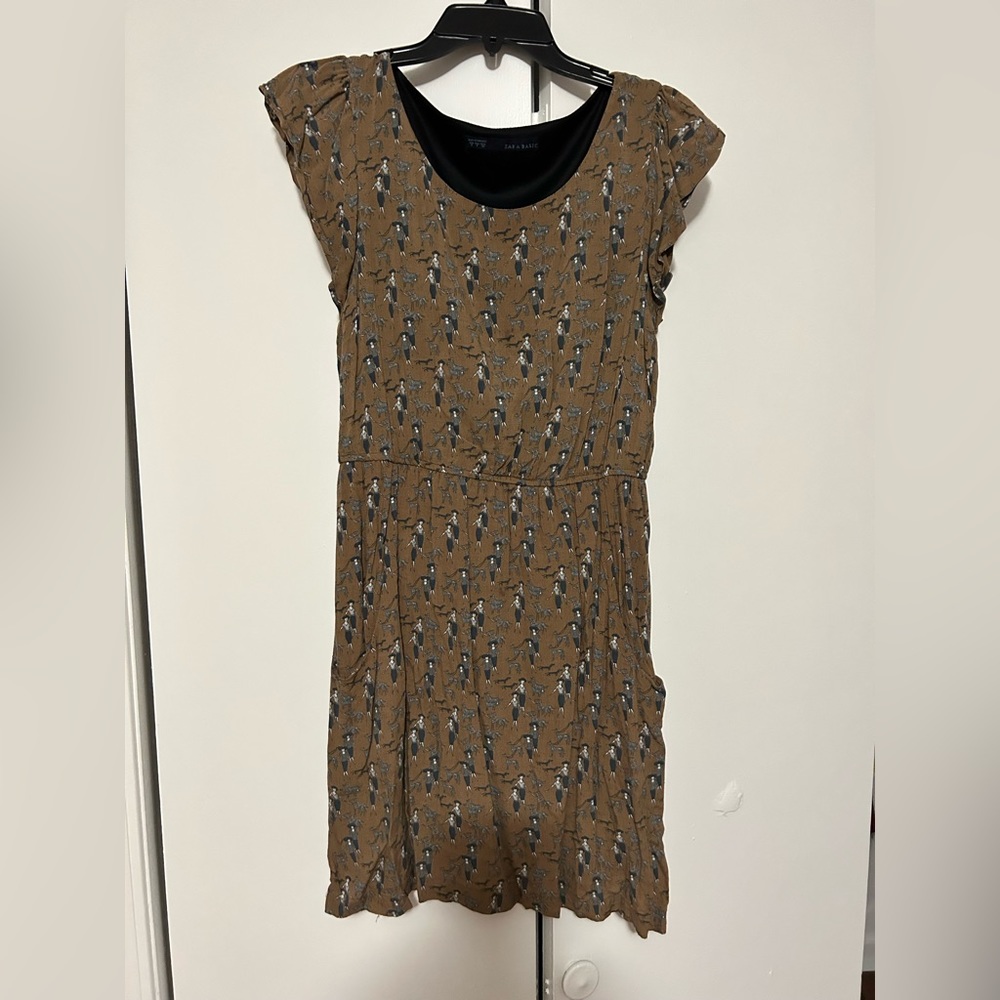 Brown ‘woman walking dog’ pattern dress